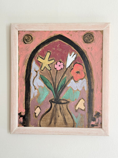Modern British School oil on board painting of stylised flowers by a gothic arch in a pale frame, photographed against a light wall