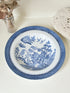 Minton Blue Willow serving dish dated 1928 with blue transfer pattern shown on a white surface.