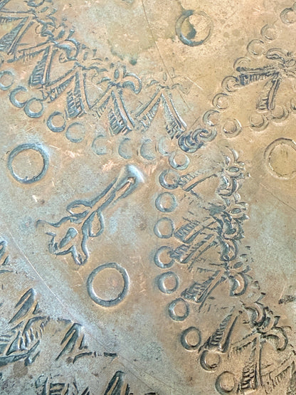 Vintage hand engraved copper tray with sunburst centre, decorative border and aged verdigris patina for wall or tabletop styling