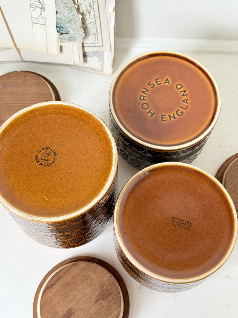 Hornsea Heirloom coffee tea and sugar canister set in autumn brown stoneware with teak lids photographed on a white surface