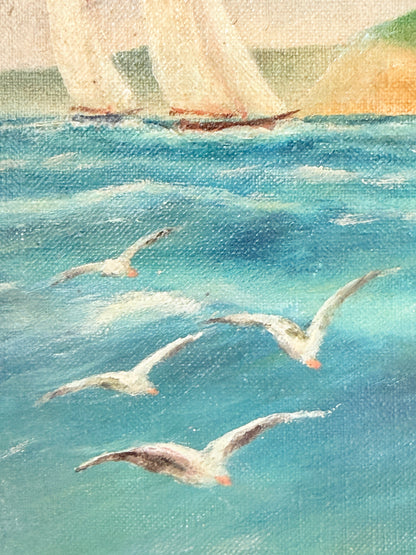 A close-up of a painted seascape showing turquoise-blue water with several white gulls in flight and the tops of sailboats in the distance.