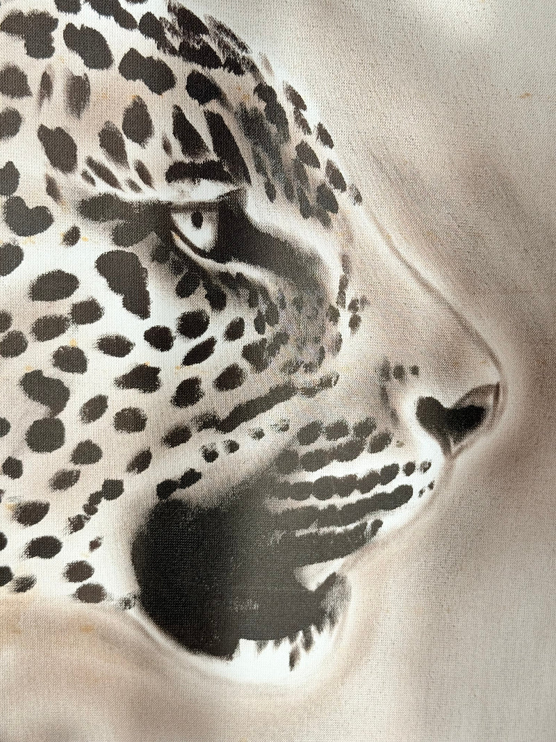 Original oil painting of a leopard profile, framed and displayed against a white background.