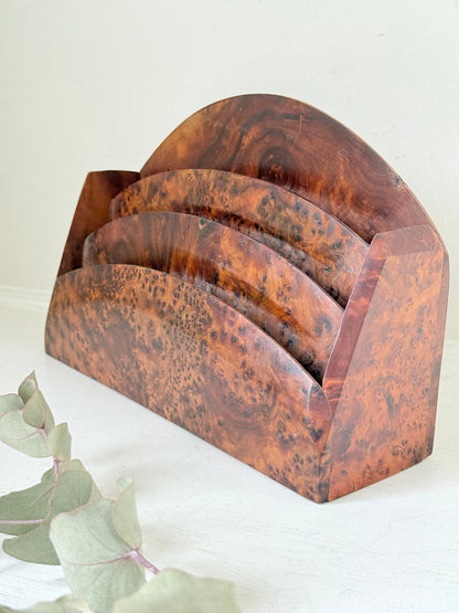 Three-slot curved letter rack made from polished burl wood with rich swirling grain, mid-century style desk organiser.