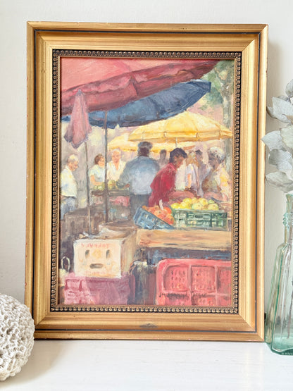 Impressionist oil on board of a busy fruit market with figures and awnings in a gilt frame