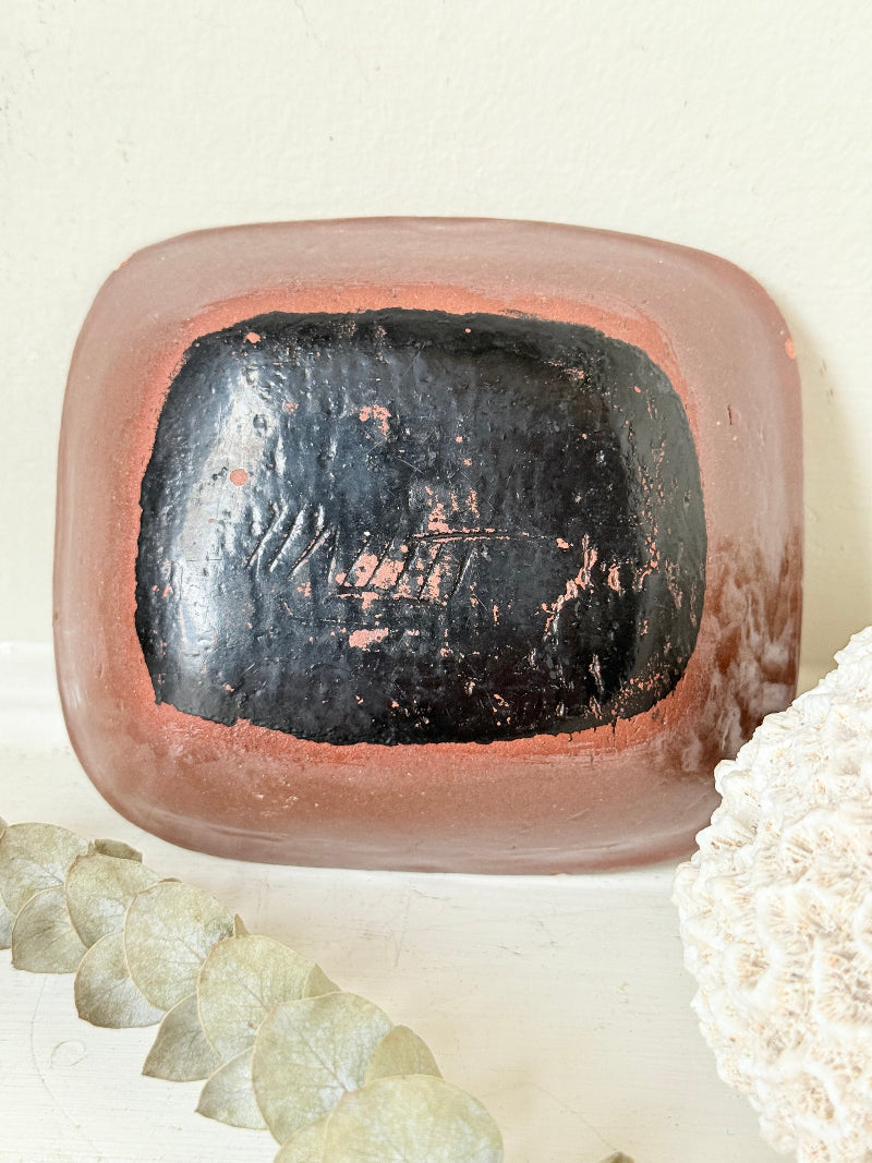 Vintage studio pottery soap dish with hand painted blue bird motif and terracotta rim, photographed on a white surface