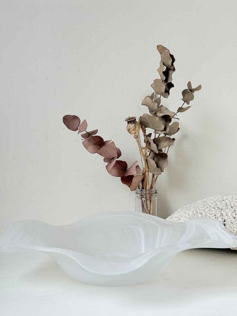 Large vintage white matt glass swirl ruffle bowl photographed on a white surface