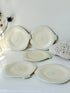 Set of five vintage Shorter and Son fish side plates in cream with pale green detail, photographed on a white surface