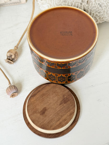 Hornsea Heirloom tea storage jar in autumn brown stoneware with teak lid photographed on a white surface