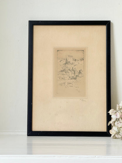 framed print of windsor castle viewed from the thames with fine line detail photographed on white surface