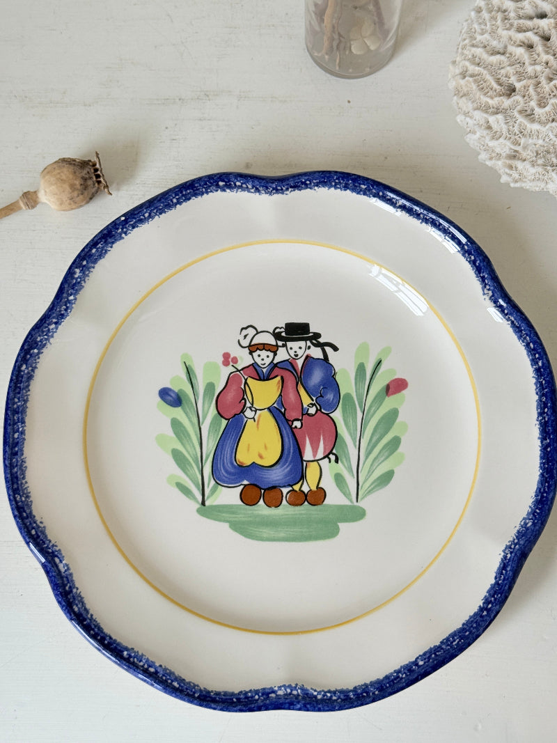 Vintage French ceramic serving plate by Faïencerie de Pornic with Quimper style Breton couple design and blue scalloped rim