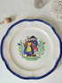 Vintage French ceramic serving plate by Faïencerie de Pornic with Quimper style Breton couple design and blue scalloped rim