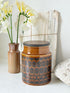 Hornsea Heirloom coffee storage jar in autumn brown stoneware with teak lid photographed on a white surface