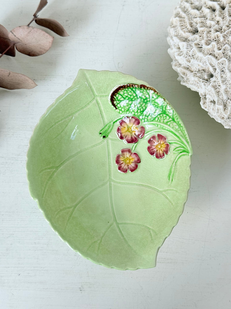 Vintage Carlton Ware green leaf pedestal dish with pansy decoration, photographed on a white surface