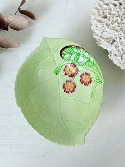 Vintage Carlton Ware green leaf pedestal dish with pansy decoration, photographed on a white surface