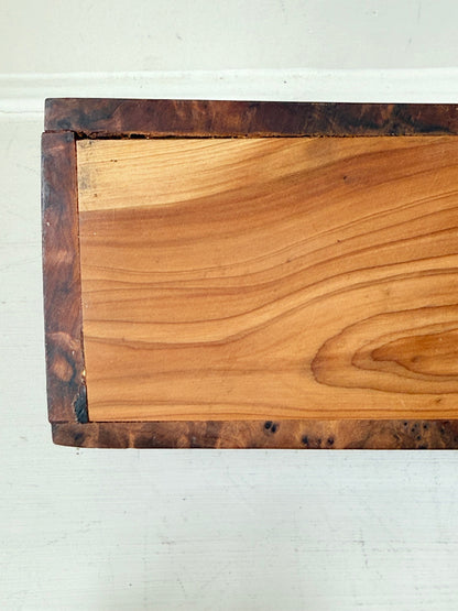 Three-slot curved letter rack made from polished burl wood with rich swirling grain, mid-century style desk organiser.