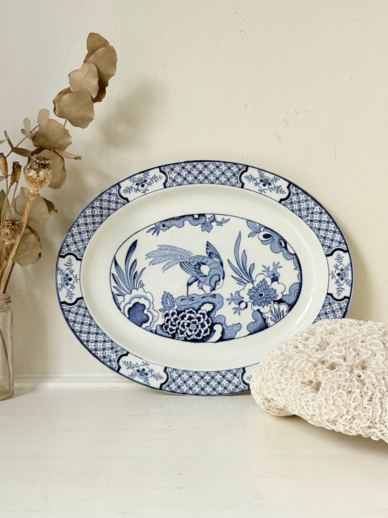 Vintage Woods and Sons Yuan blue and white serving platter photographed on a white surface