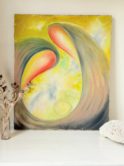 Abstract oil painting on canvas in yellow, pink and grey tones, photographed upright on a white surface.
