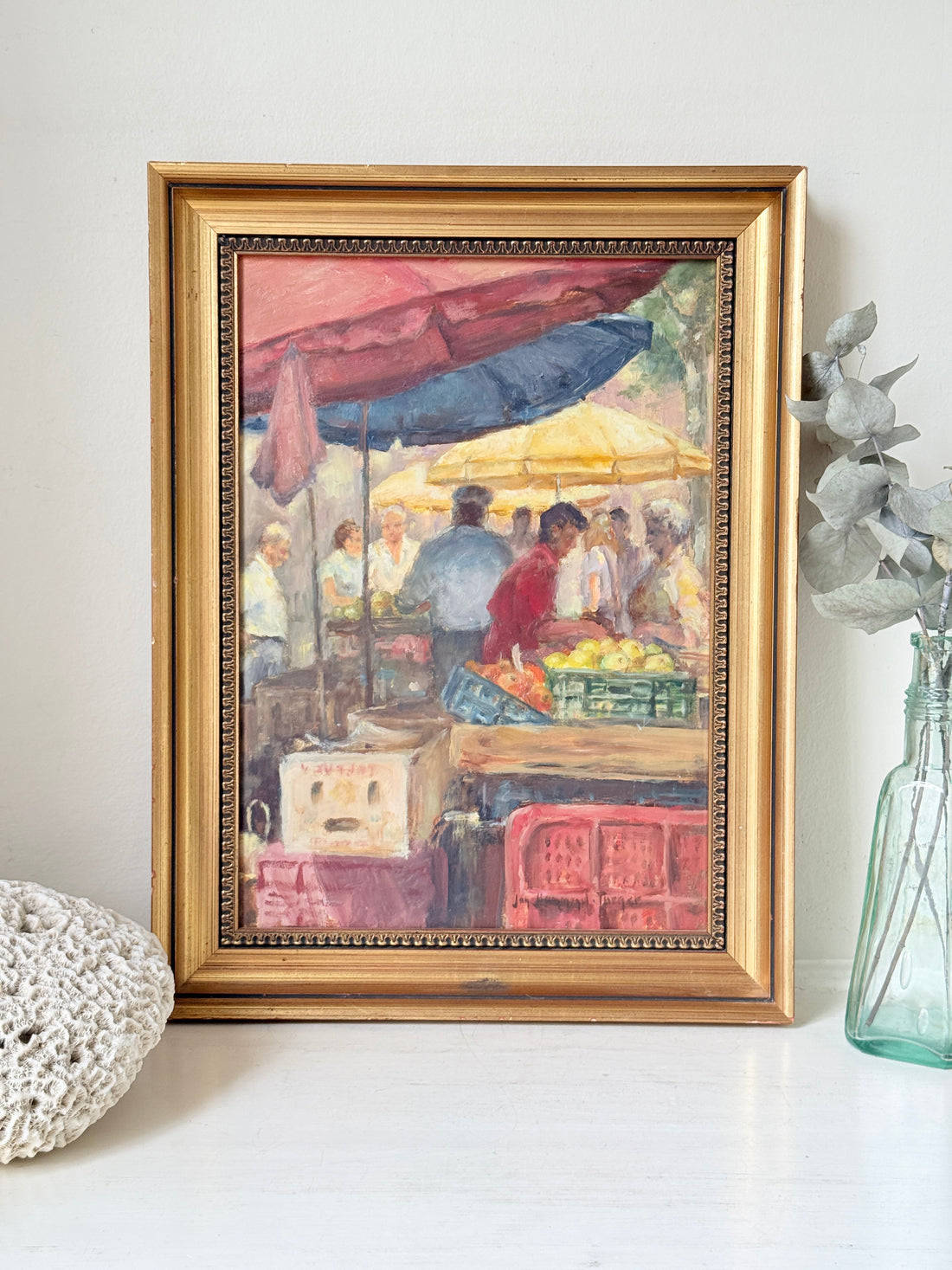 Impressionist oil on board of a busy fruit market with figures and awnings in a gilt frame