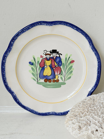 Vintage French ceramic serving plate by Faïencerie de Pornic with Quimper style Breton couple design and blue scalloped rim