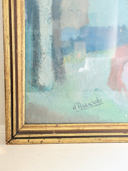 Close-up of a framed painting showing a textured abstract scene in soft blue, green, and beige tones, with a visible signature reading &