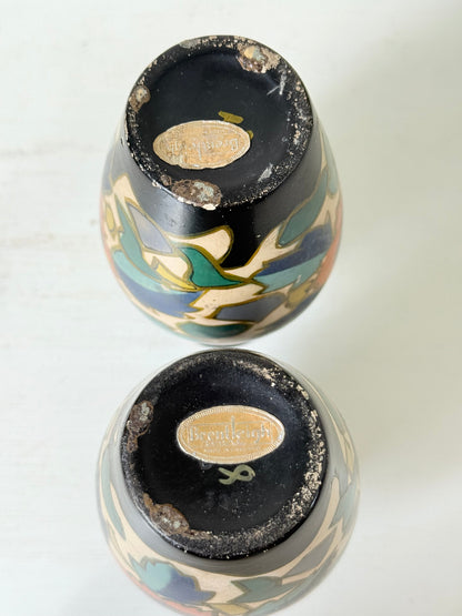 Pair of hand painted Brentleigh Ware Art Deco stoneware vases with bold floral design, photographed on a white surface