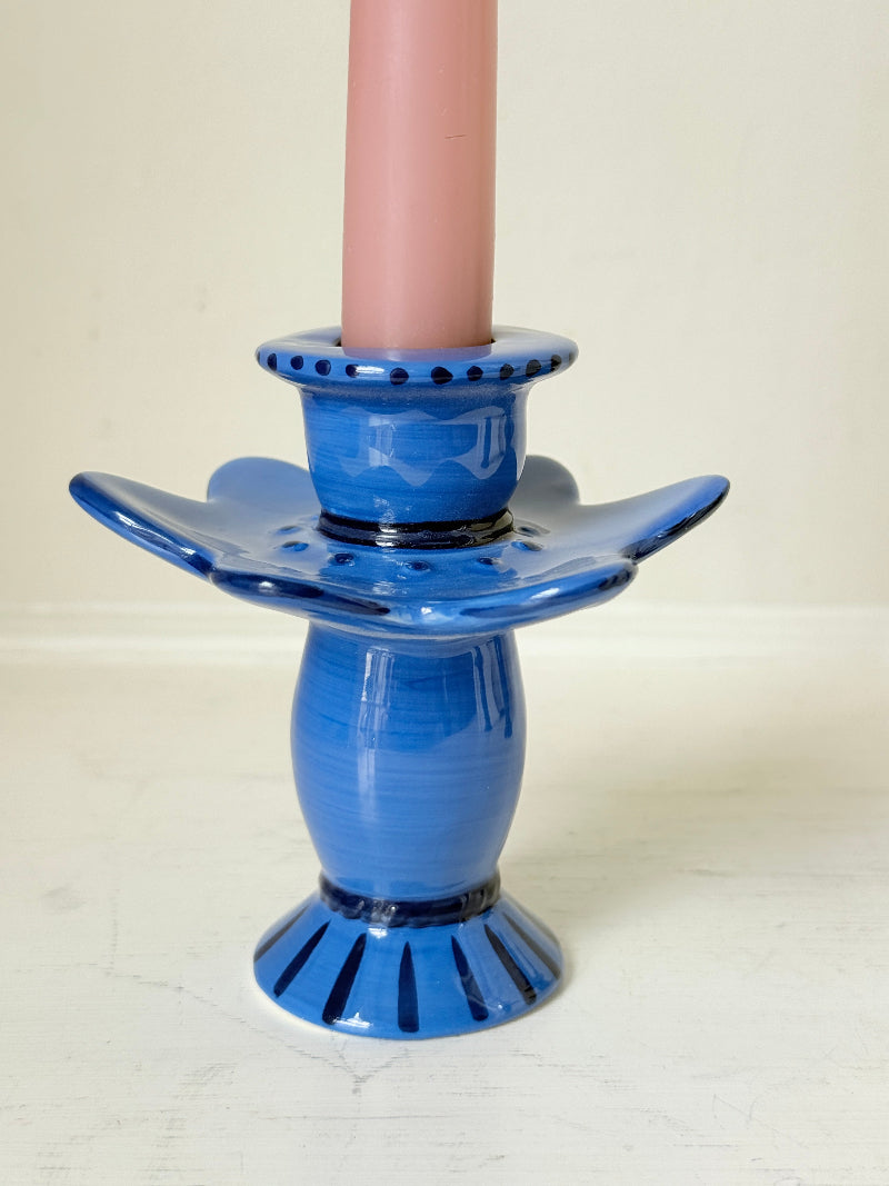  &amp;Klevering Amsterdam cobalt blue ceramic candle holder with hand painted detail and pink taper candles