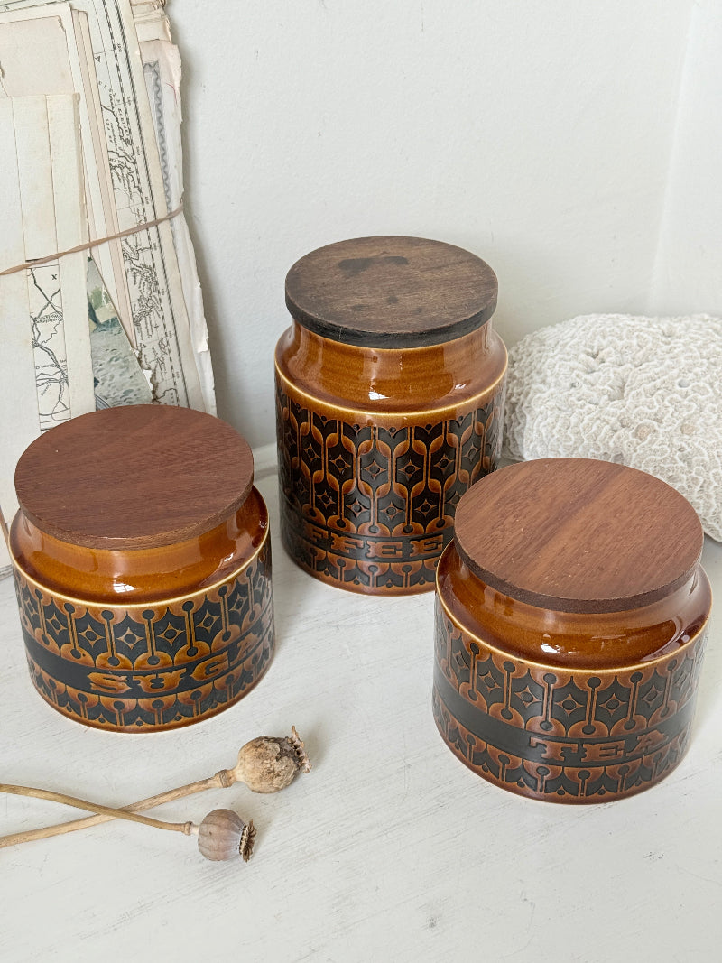 Hornsea Heirloom coffee tea and sugar canister set in autumn brown stoneware with teak lids photographed on a white surface