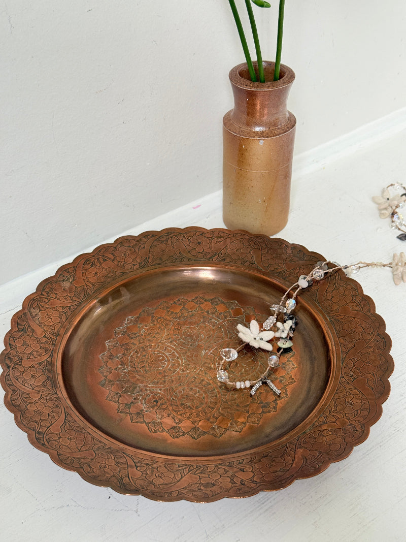 Vintage hand engraved copper tray with scalloped edge, bird and floral motif and warm aged patina for boho interiors
