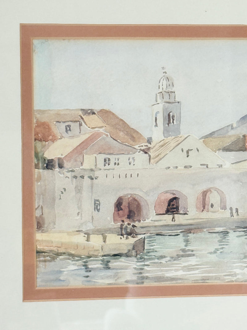 Framed watercolour painting of Dubrovnik harbour and old town architecture, photographed on a white surface