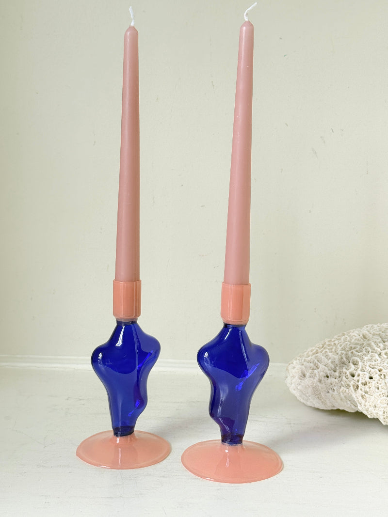 Pair of &amp;Klevering Amsterdam Flux glass candle holders in dark blue and pink with pink taper candles