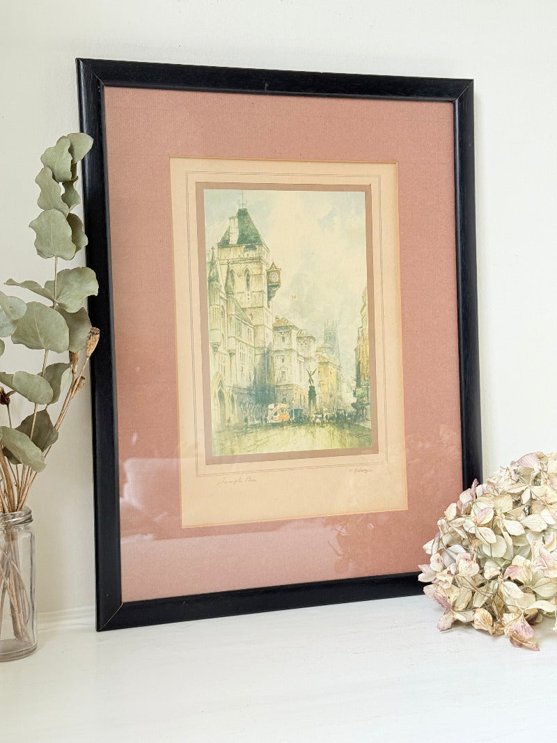 vintage framed print of temple bar watercolour by f robson in black frame with apricot and dusky pink mount on white surface