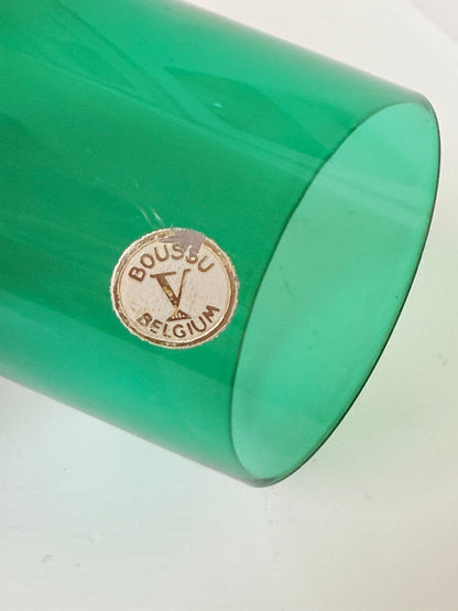 Set of six mid-20th century Boussu coloured glass beakers in rainbow hues, green with original label, photographed on white surface.