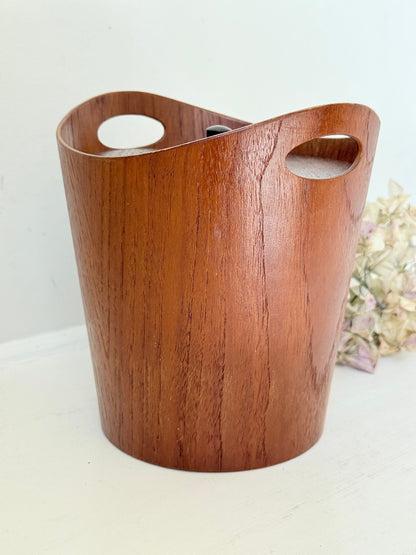 Vintage Swedish teak ice bucket with lid and white liner, photographed on a white surface
