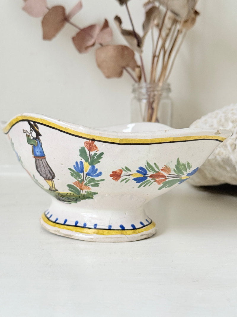 French Quimper faience sauce boat with Breton figure