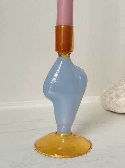 Pair of &amp;Klevering Amsterdam Flux glass candle holders in light blue and amber with pink taper candles