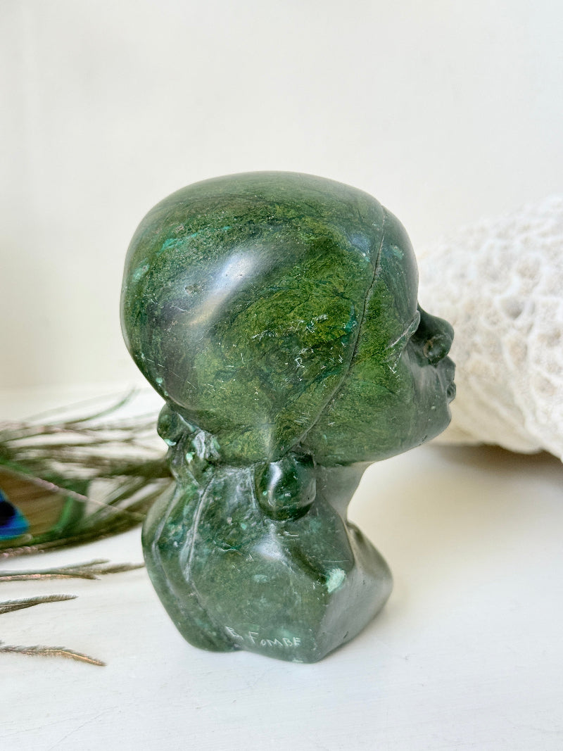 Barnabas Fombe verdite Shona bust of a woman with a head wrap, signed, from Zimbabwe