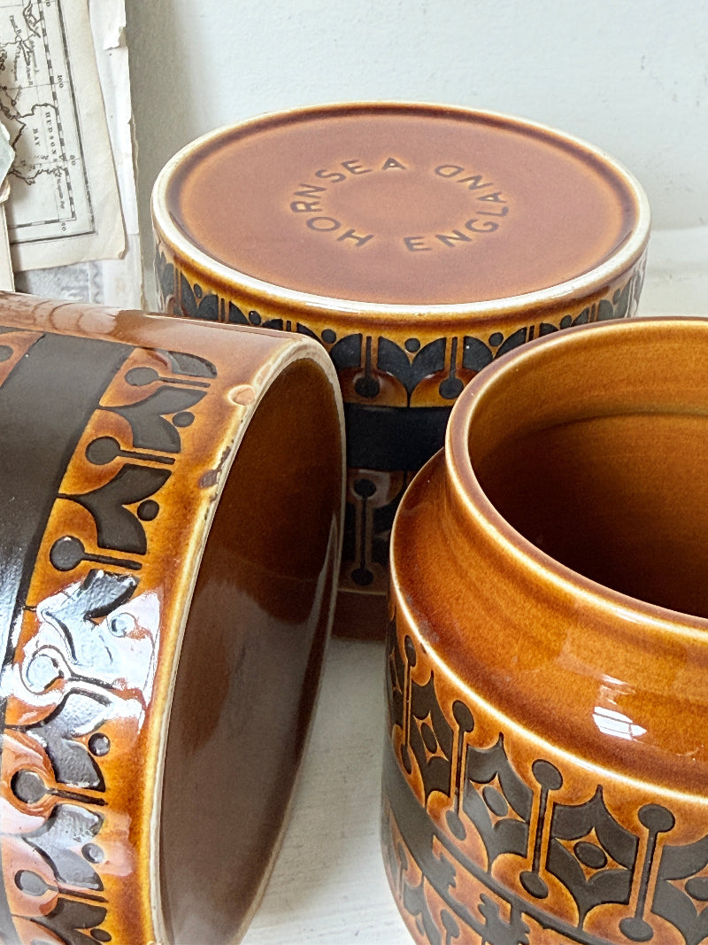 Hornsea Heirloom coffee tea and sugar canister set in autumn brown stoneware with teak lids photographed on a white surface
