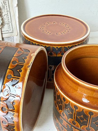Hornsea Heirloom coffee tea and sugar canister set in autumn brown stoneware with teak lids photographed on a white surface