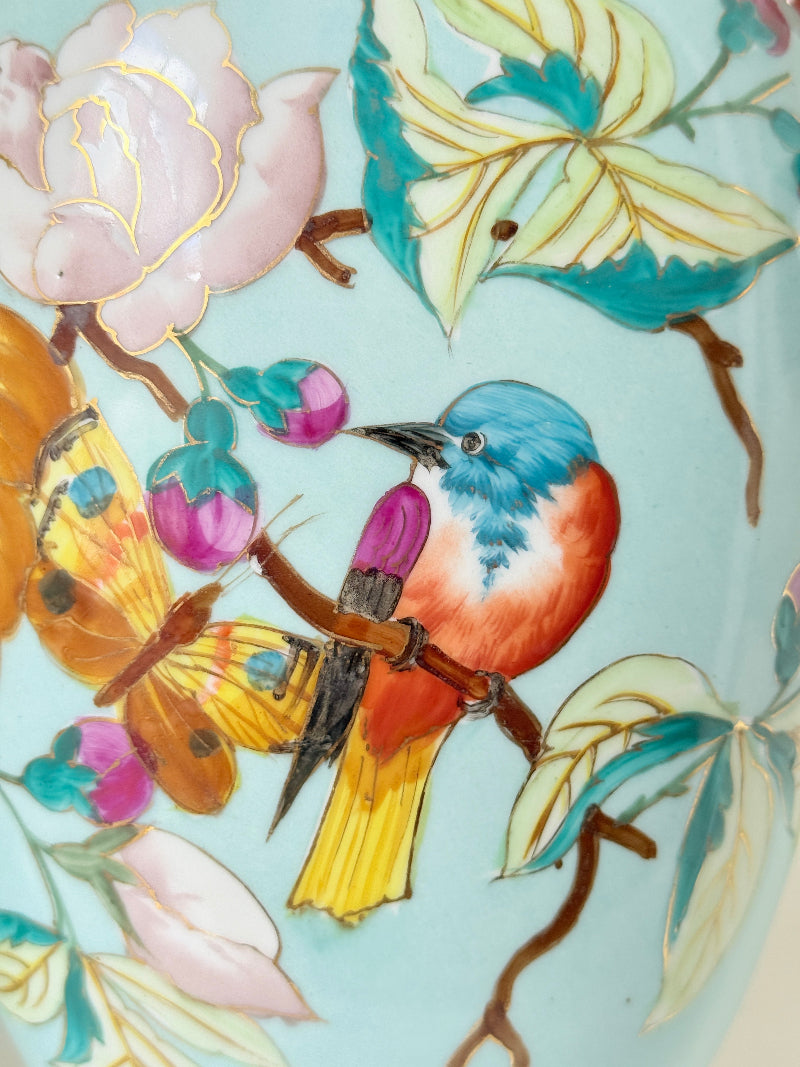 Pair of Paris porcelain Aesthetic Movement vases from the late 1800s, hand painted with birds, blossom and coral handles