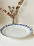 Vintage Burleigh Ware blue and white oval serving platter photographed on a white surface