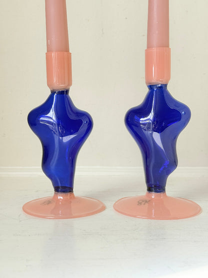 Pair of &amp;Klevering Amsterdam Flux glass candle holders in dark blue and pink with pink taper candles