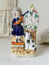 Victorian Staffordshire flatback clock group with girl spaniel and parrot hand painted in cobalt blue and orange