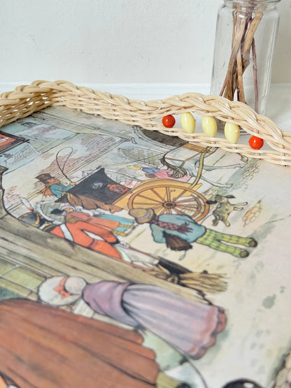 Vintage melamine tray with wicker effect edge and Victorian street scene, photographed on a white surface