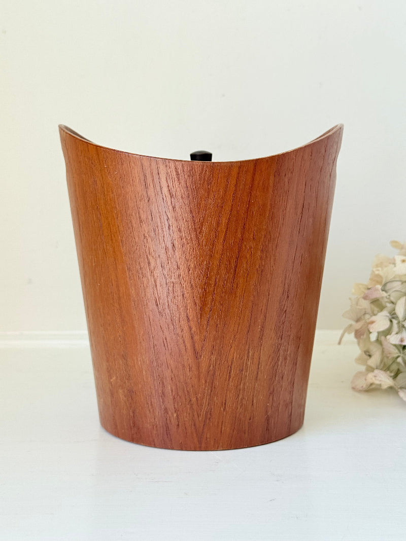 Vintage Swedish teak ice bucket with lid and white liner, photographed on a white surface
