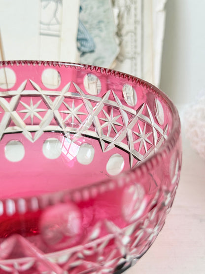Antique cranberry cut to clear glass pedestal bowl with star and diamond pattern, clear foot and rich pink glass