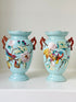Pair of Paris porcelain Aesthetic Movement vases from the late 1800s, hand painted with birds, blossom and coral handles