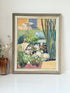 Vintage oil on board painting of waterlilies on a pond by Muriel Hester Broughton (1904–2003), monogrammed MB, framed in silver wood, photographed on a white surface


