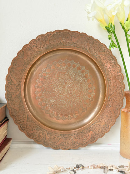 Vintage hand engraved copper tray with scalloped edge, bird and floral motif and warm aged patina for boho interiors