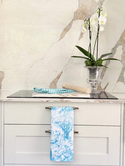 The Blue Loft toile cotton tea towel in turquoise on white with rural scenic print
