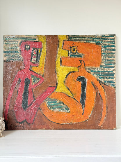 An abstract expressionist painting on canvas featuring two stylized human figures in pink and orange, set against a brown and yellow background with textured teal stripes. The painting is displayed leaning against a white wall on a white shelf.